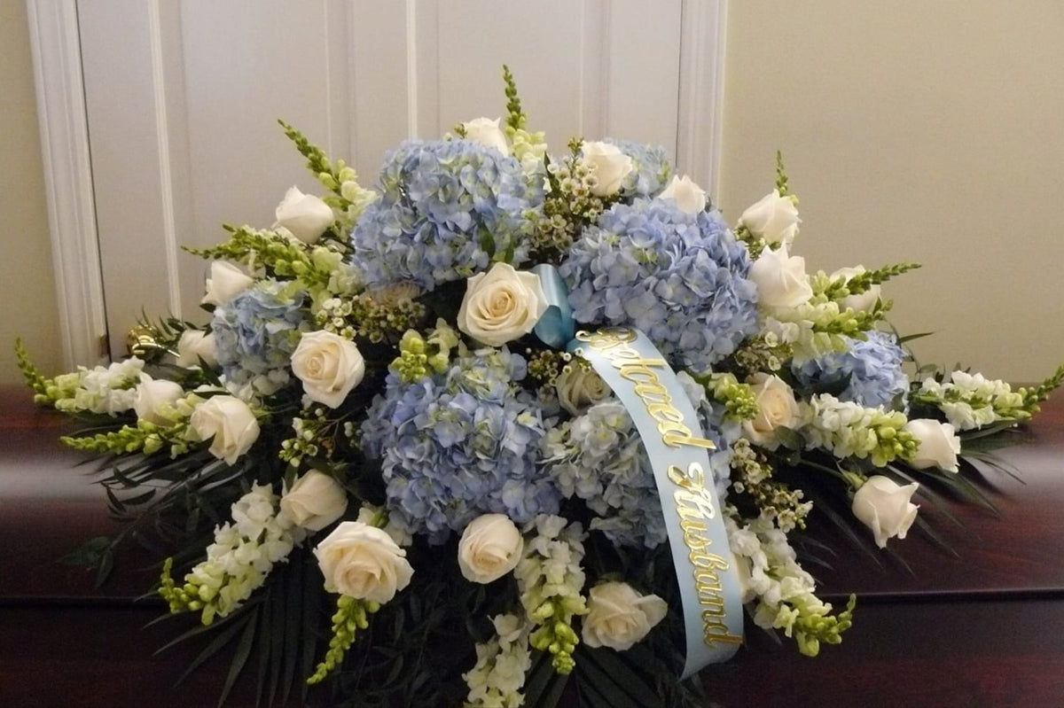 Blue Serenity - Casket Spray Blue & White Flowers - NYC Bouquet Delivery